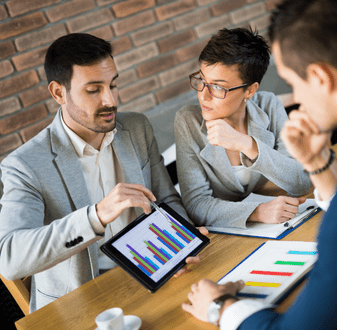 Hotel employees discussing data