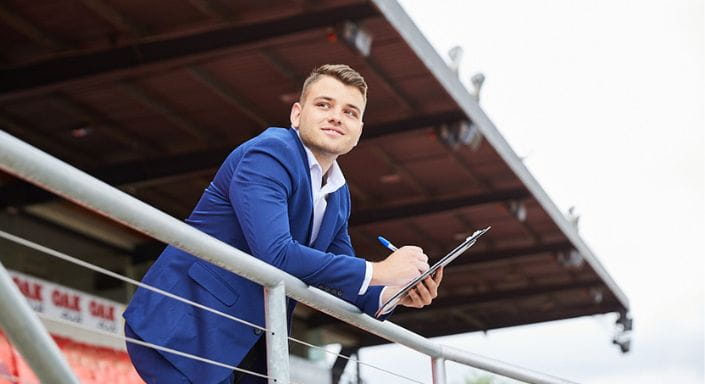 Sports Management student in a stadium