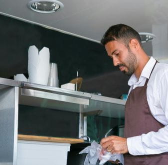 Man working in hospitality kitchen