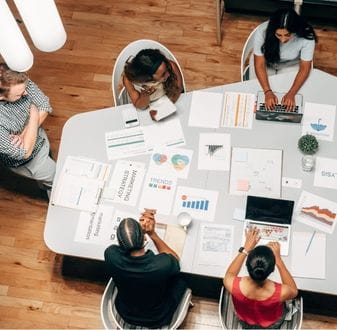 A group of people defining marketing