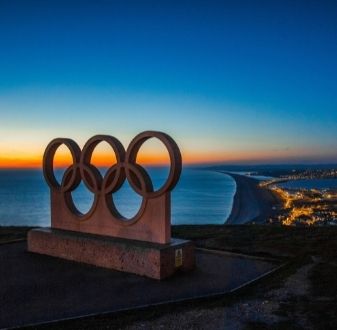 Olympic rings over city