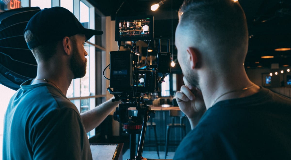 Film crew workers filming