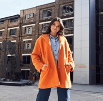 Briellyn Turton, Interior Design graduate, standing outside Billy Blue's Sydney campus in Ultimo