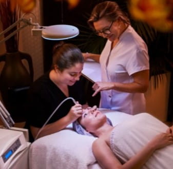 Beauty facial student and teacher