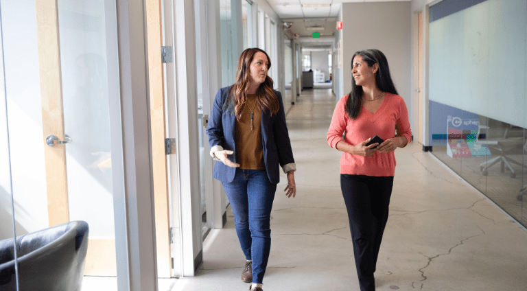 Two teachers talking before interview