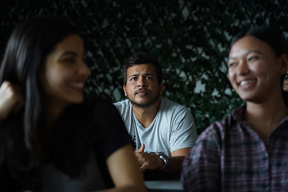international student looking concerned in a classroom