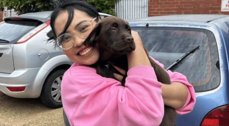International student with a dog