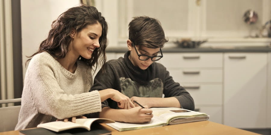 Teacher educating child