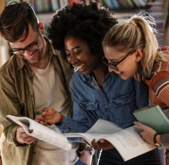 students reading a book