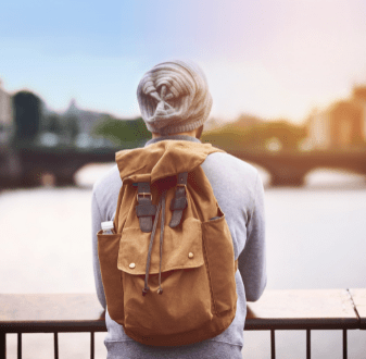 lonely-student-looking-over-bridge