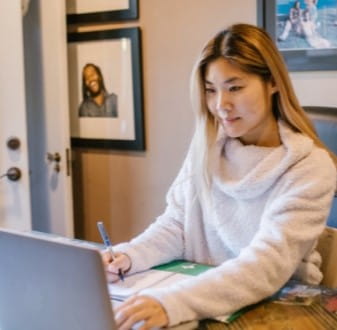 IT worker working on laptop