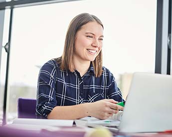 Torrens University Australia | Woman on Laptop