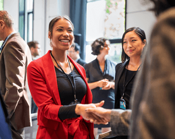 University Impact Alumni | Business woman handshaking | Torrens University