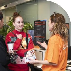 Torrens University | Open Day | Staff helping student at registration