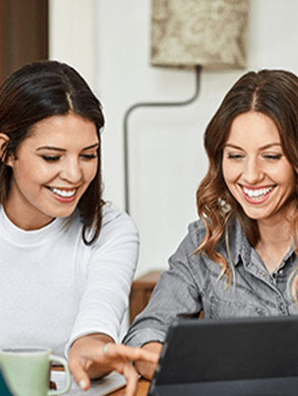 Two females applying for Love What You Do scholarship