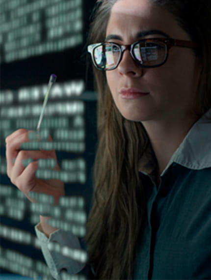 Female researcher analysing data