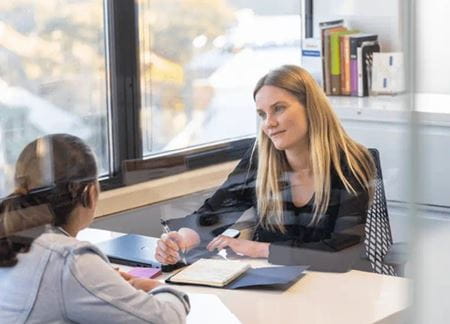 Woman listening in a meeting