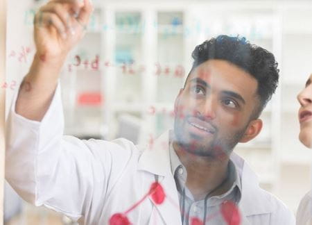 master of global project management and master of public health man drawing on board hero image | Torrens University