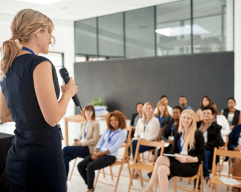 education-courses-women-lecturing-students-hero-tua