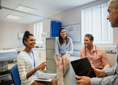 Medical professionals chatting