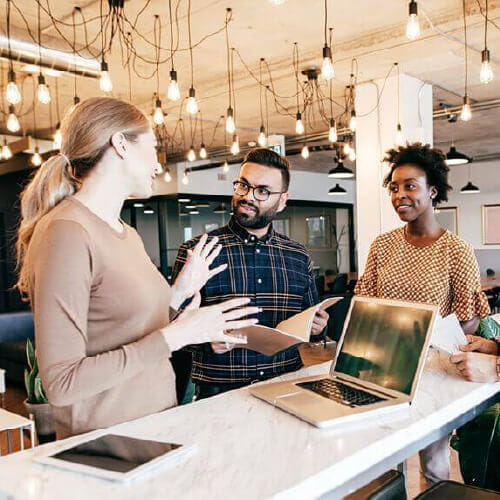 Four people working together