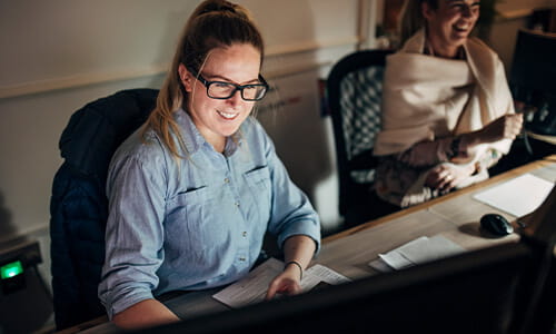 Female business students on computer