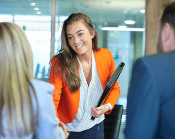 University Impact | Young woman comes into an interview | Torrens University Australia