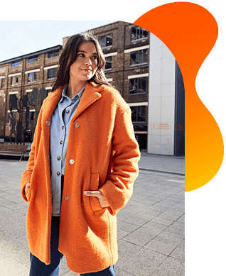Torrens University Australia | About | Woman in Orange Coat